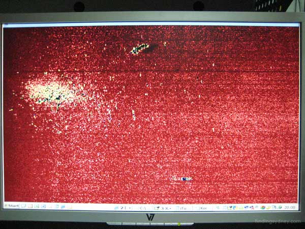 Sonar image of the Kormoran wreckage field showing the bow section and a large debris field.