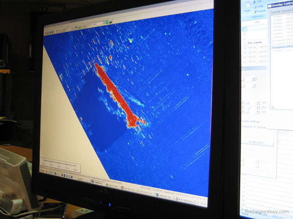 Final high-resolution AMS60 sonar image of the HMAS Sydney wreck showing the hull, acoustic shadow, and the break at the bow.