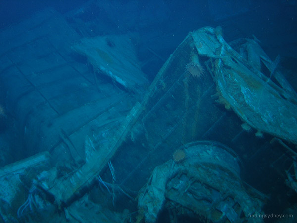 The upturned searchlight platform which was torn away from the forward funnel during the sinking.
