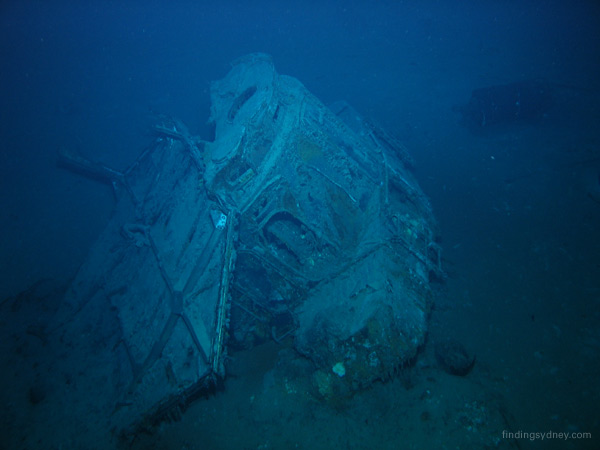 The bridge deck head lying against the Director Control Tower.