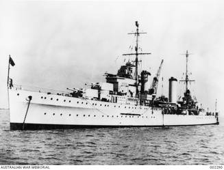 The Australian cruiser HMAS Sydney at anchor in the harbour following repairs to damage inflicted in action against units of the Italian Navy in the Mediterranean area.