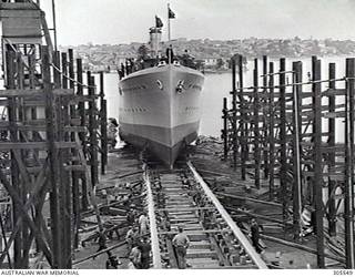 COCKATOO ISLAND DOCKYARD, SYDNEY, NSW. 1940-02-10. THE LAUNCHING OF THE SLOOP HMAS WARREGO (II). (NAVAL HISTORICAL COLLECTION).