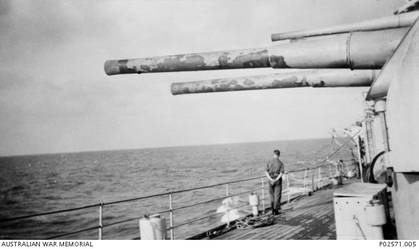 The forward six inch guns of HMAS Sydney II showing the blistered paint from the heat of sustained firing at the Italian cruiser Bartolomeo Colleoni during the battle of Cape Sparda, off the coast of Crete. The Italian ship was immobilised by accurate fire from the Sydney's six inch guns and then sunk by torpedo's launched from the escorting British destroyers.