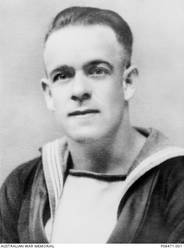 Studio portrait of 18171 Leading Stoker (Ldg Sto) John Thomas Henry (Jack) Norton, HMAS Sydney, of Redfern, NSW. Ldg Sto Norton enlisted on 8 February 1927, and joined the crew of HMAS Sydney [II] on 4 February 1939. On 20 November 1941 he was killed in action, when the Sydney was sunk off the coast of Western Australia by the German raider Kormoran, with the loss of all crew. He was 35 years old. Jack Norton's younger brother, 18110 Able Seaman William Frederick Cecil Norton, also enlisted in February 1927 and was also lost with the Sydney.