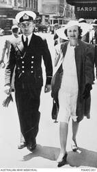 Informal portrait of 17515 Warrant Engineer Alexander Bailie Biggs of Stanmore, NSW, with his wife Alice. Biggs was a career sailor who enlisted in the RAN on 28 April 1926 and rose through the ranks to be promoted to Warrant Engineer on 10 October 1938. He was posted to HMAS Sydney II in August 1939 and was one of the 645 members of the crew killed on 20 November 1941 when the Sydney was sunk by the German auxiliary cruiser Kormoran off the West Australian coast.