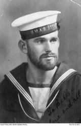 Studio portrait of S2940 Able Seaman (AB) Lyal Llewellyn Powell, HMAS Stuart, of Newtown, NSW. Enlisting in the RAN in August 1939, AB Powell was killed on board HMAS Sydney II when it was sunk by the German auxiliary cruiser Kormoran on 20 November 1941.