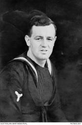 Studio portrait of H1564 Stoker Second Class (Sto II) Percy Albert Johnson, RAN, of Tasmania. Sto II Johnson enlisted on 17 March 1941. He was killed in action, aged 22, when HMAS Sydney II was sunk in the Indian Ocean by the German auxiliary cruiser Kormoran on 20 November 1941.