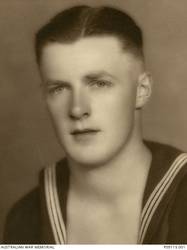 Studio portrait of Able Seaman (AB) Michael Henry Joseph Walsh. Born in East Melbourne on 8 September 1921, Walsh enlisted in the Royal Australian Navy on the 11 May 1938 at the age of 16. He was killed in action on 20 November 1941 when the Sydney was sunk off the coast of Western Australia by the German raider Kormoran, with the loss of all crew.