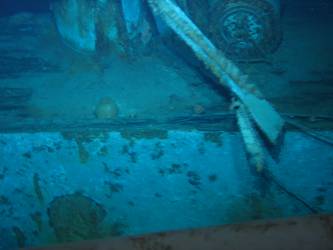Port side ship's ship side aft cable reel in background