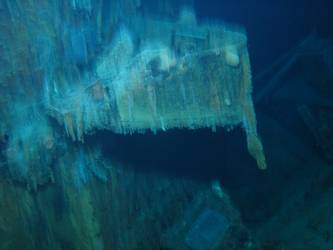 Damage to aft end, port, forward superstructure