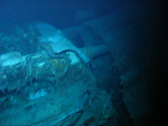 Fore deck folded back over barrels of a turret