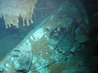 Shell exit hole in mild steel plate. Possibly wreckage from A turret