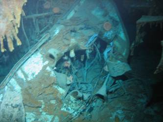 Shell exit hole in mild steel plate. Possibly wreckage from A turret
