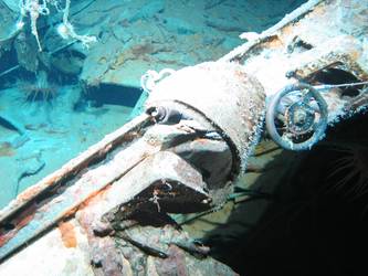 Wreckage on seabed near forward part of ship showing valve wheel
