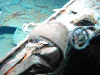 Wreckage on seabed near forward part of ship showing valve wheel