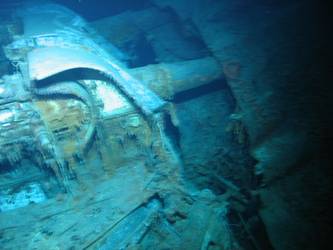 Fore deck folded back over barrels of A turret