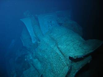 Fore deck folded back over barrels of A turret