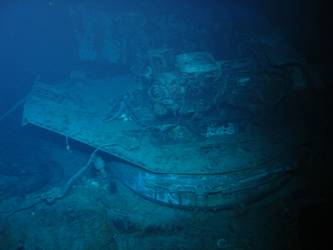Fore deck folded back over barrels of A turret