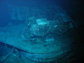 Fore deck folded back over barrels of A turret