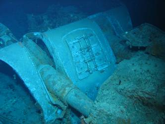 Close-up of fore deck folded back over barrels of A turret