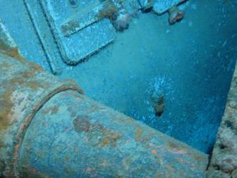 Shell hit beneath A turret sighting ports