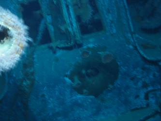 Close-up of shell hit beneath B turret sighting ports