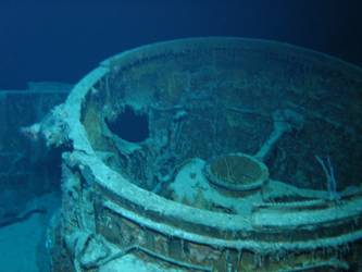 Shell damage to barbette for Director Control Tower