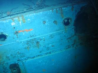 Shell hits on port side of ship in vicinity of galley