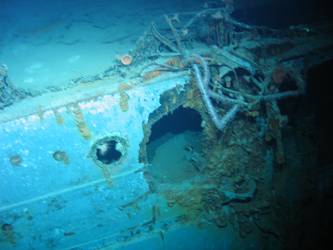 Shell hits on port side of ship in vicinity of galley