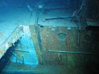 Officers WC's aft end of port side 4-inch gun deck. Burnt