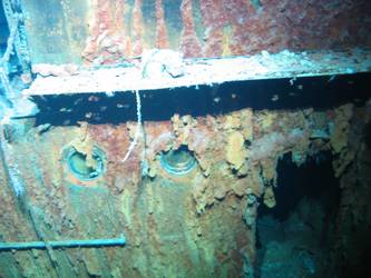 Officers WC's aft end of port side 4-inch gun deck. Burnt
