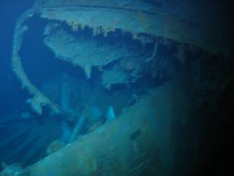 Top of forward funnel drapped over Y turrent viewed from stbd side