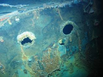 Damage to ship's stbd side in vicinity of ship's galley