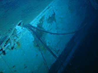 Close-up of shell hit on stb side of ship