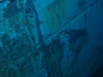 Close-up of shell hit on stb side of ship