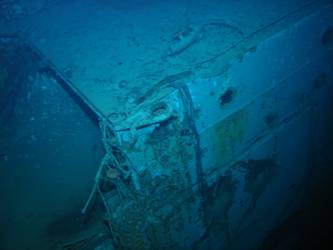 Close-up of shell hit on stb side of ship
