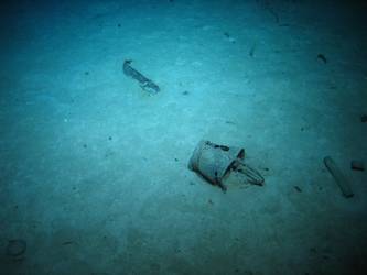 Steel bucket on seabed