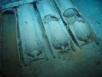 Torpedo tubes with three torpedoes remaining in mount