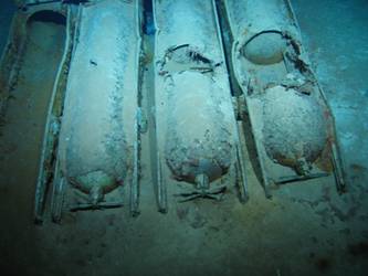 Torpedo tubes with three torpedoes remaining in mount