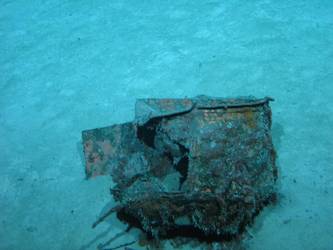 Steel drum or signal light on seabed