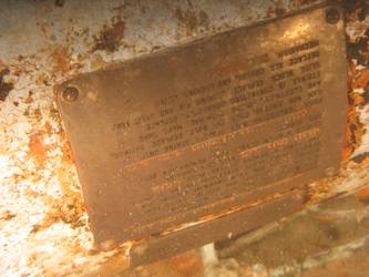 Brass tally plate on side of quadruple torpedo mount