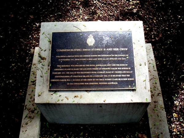 Commemorative plaque over the original gravestone on Christmas Island.